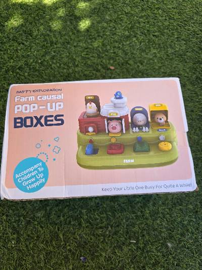 Interactief boerderij pop-up speelgoed