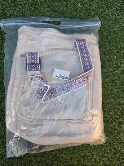 Beige canvas schoudertas met patroon